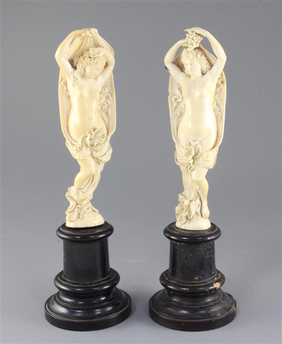 A pair of 19th century Dieppe ivory carvings of muses, Overall H. 12.25in.